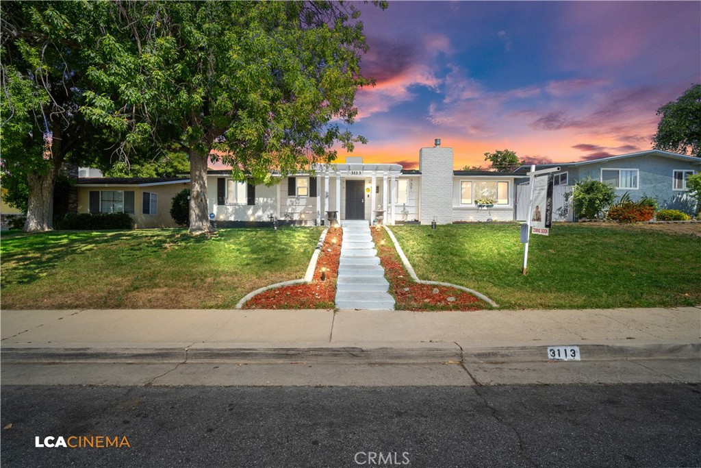 3113 Occidental Street Bakersfield, CA 93305 - Photo 1 of 19 front view of house with a yard
