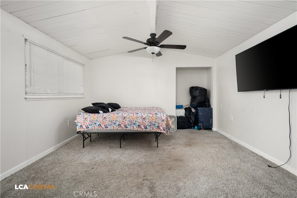 3113 Occidental Street Bakersfield, CA 93305 - Photo 15 of 19 a bedroom with bed and tv