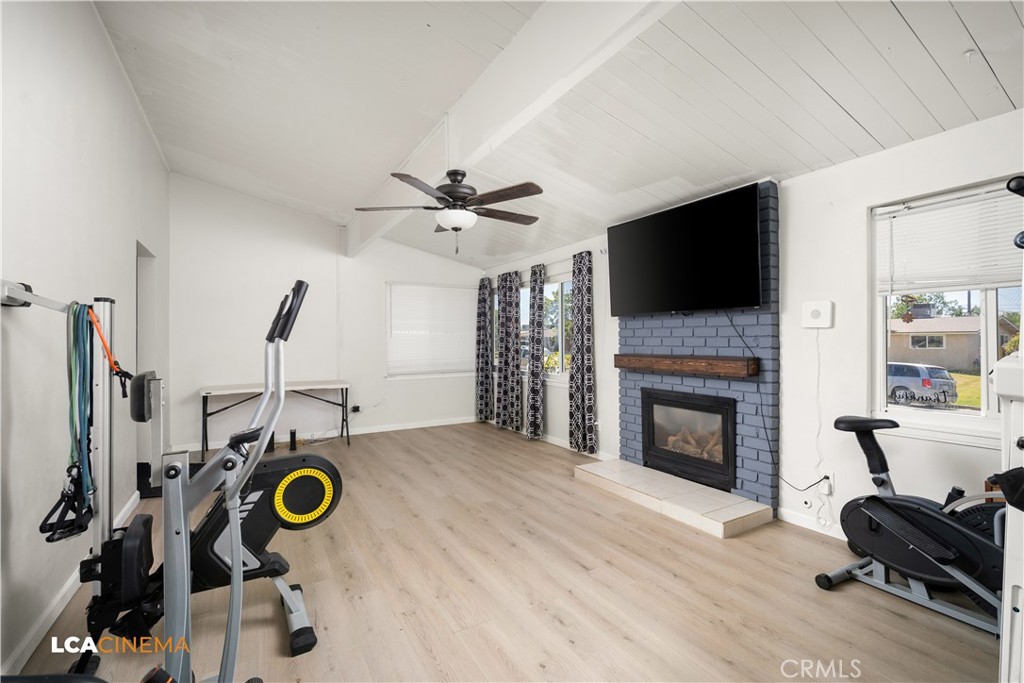 3113 Occidental Street Bakersfield, CA 93305 - Photo 4 of 19 a view of a livingroom with furniture and a fireplace