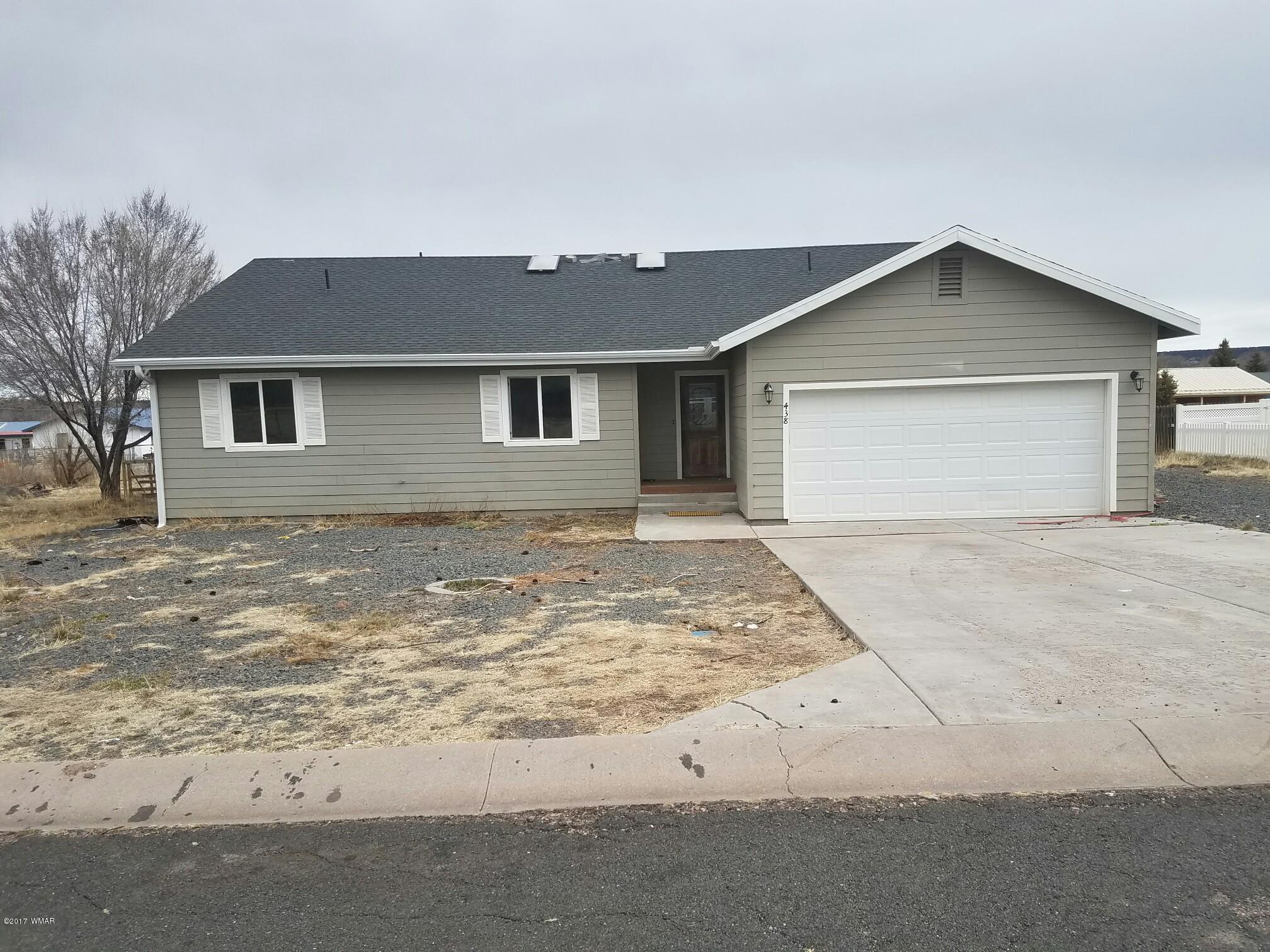 438 North Butler Street Eagar, AZ 85925 - Photo 1 of 8 a view of a house with a yard