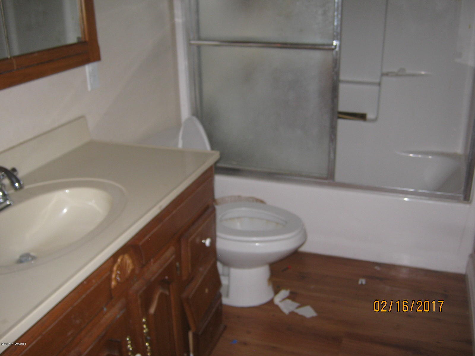 438 North Butler Street Eagar, AZ 85925 - Photo 6 of 8 a bathroom with a toilet and a shower