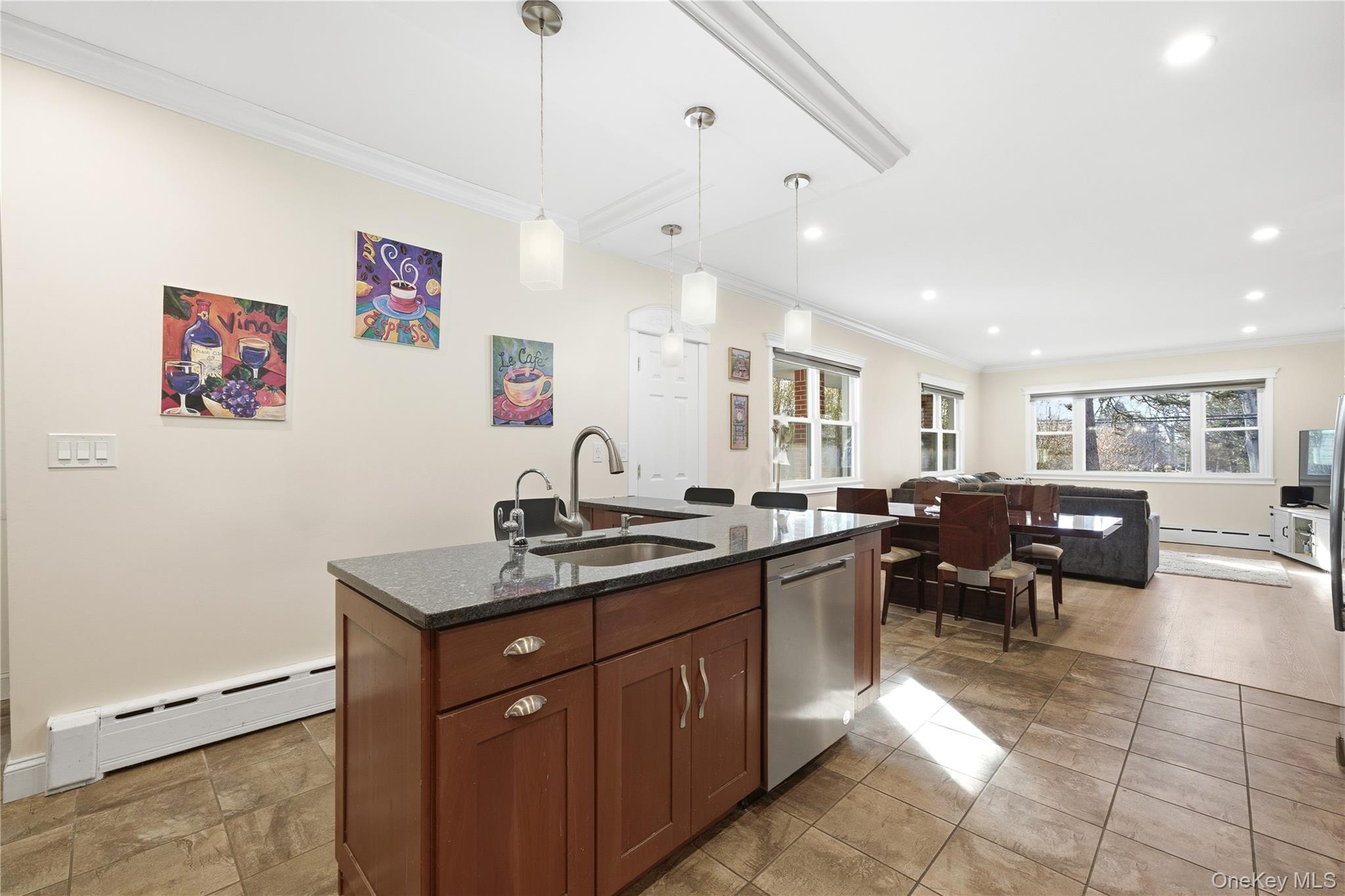 200 North Side Road Wading River, NY 11792 - Photo 11 of 30 a view of a kitchen with kitchen island a sink table and chairs