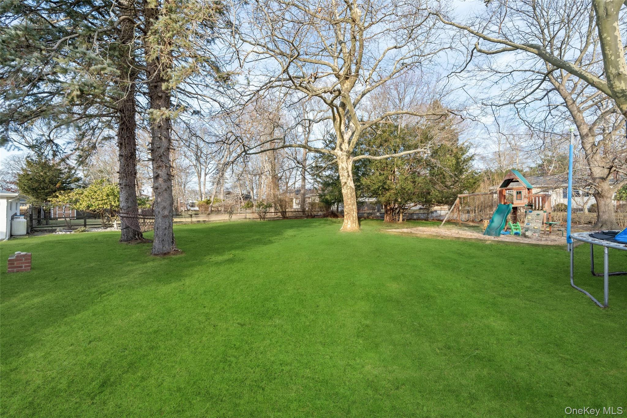 200 North Side Road Wading River, NY 11792 - Photo 21 of 30 a view of a park with large trees