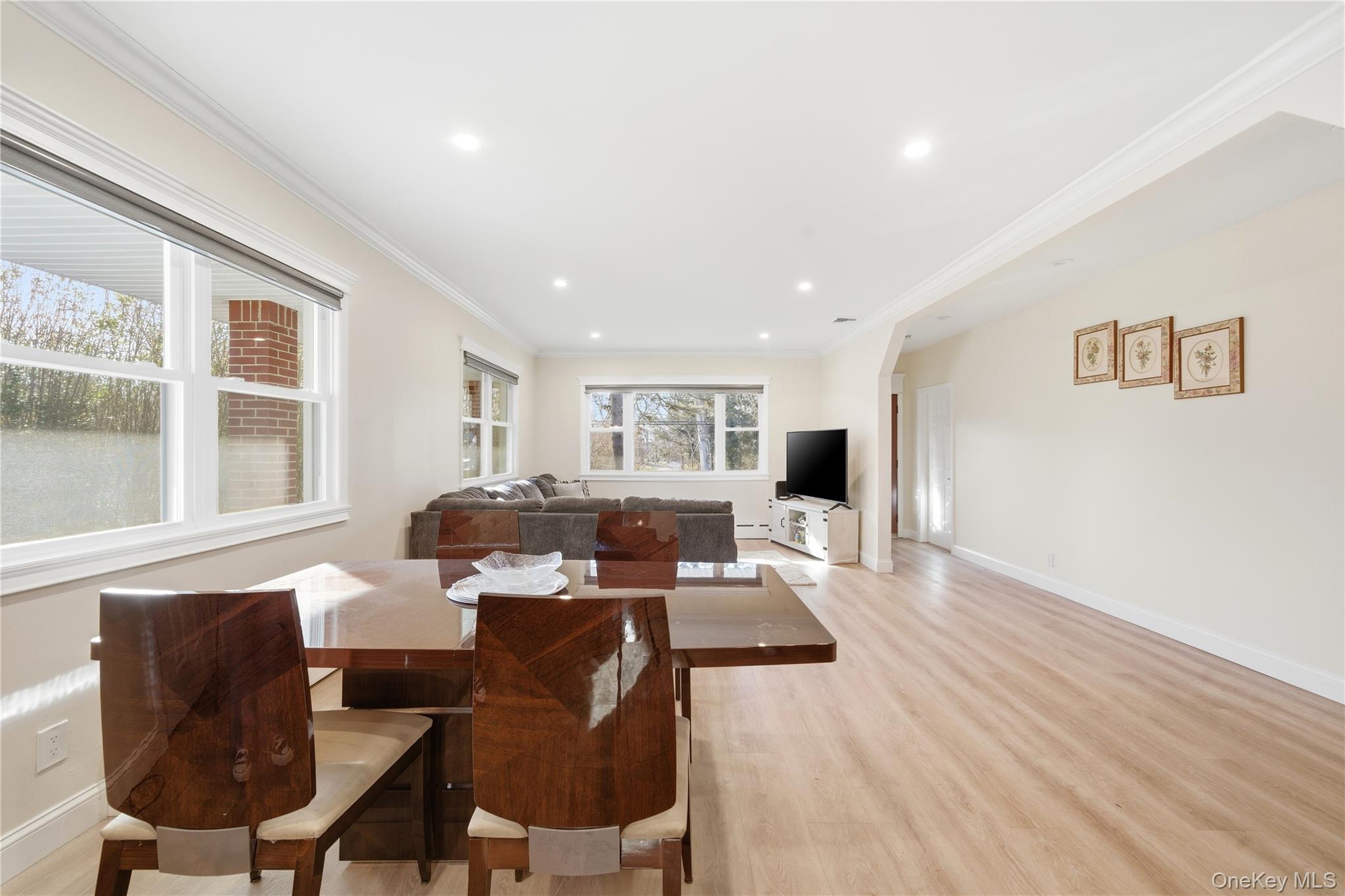 200 North Side Road Wading River, NY 11792 - Photo 6 of 30 a living room with furniture and a table