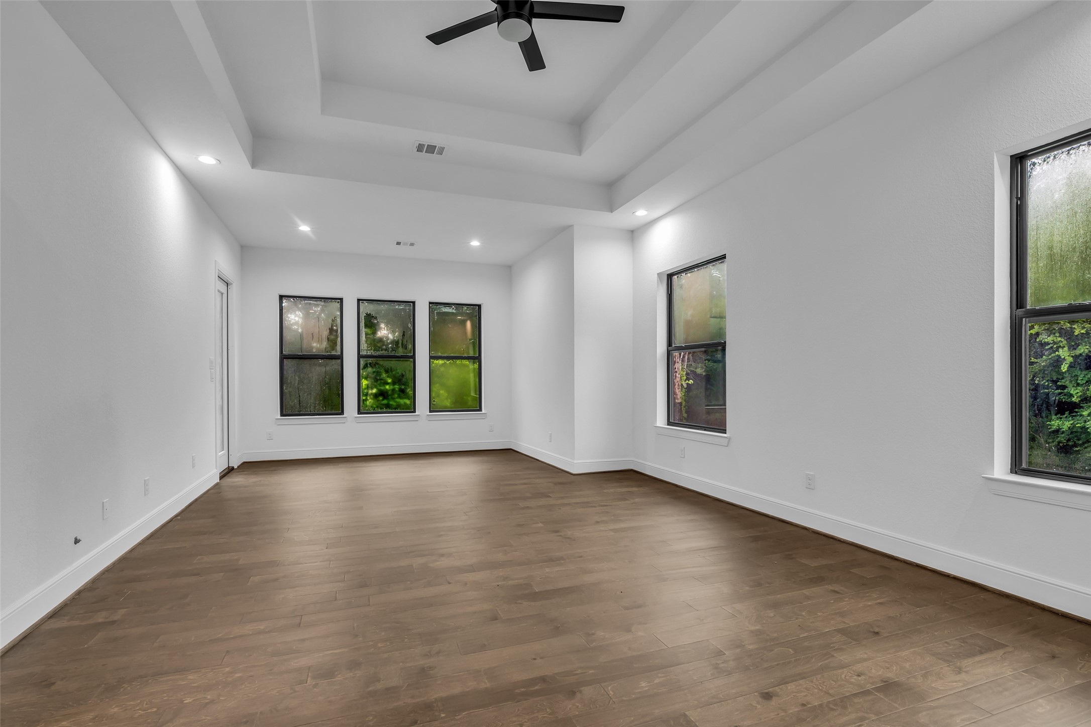 2 Deer Ridge Estates Boulevard Houston, TX 77339 - Photo 10 of 25 Primary Bedroom with patio access; on the backside of the home with views from back and side.