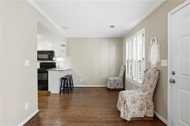 a view of livingroom with furniture and wooden floor