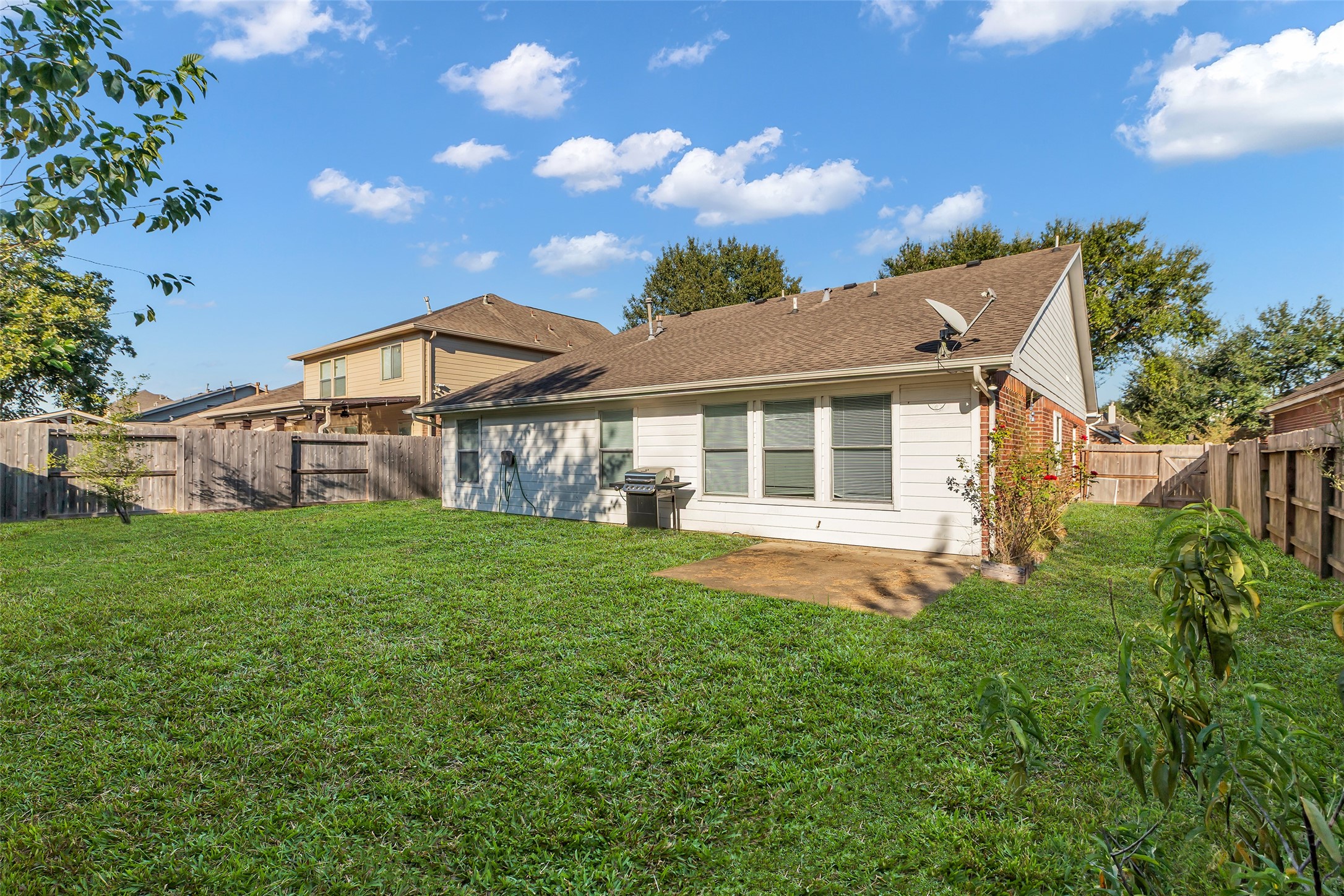 3326 Pebble Beach Lane Pearland, TX 77584 - Photo 25 of 32 Great sized backyard to enjoy quality time with family and friends.