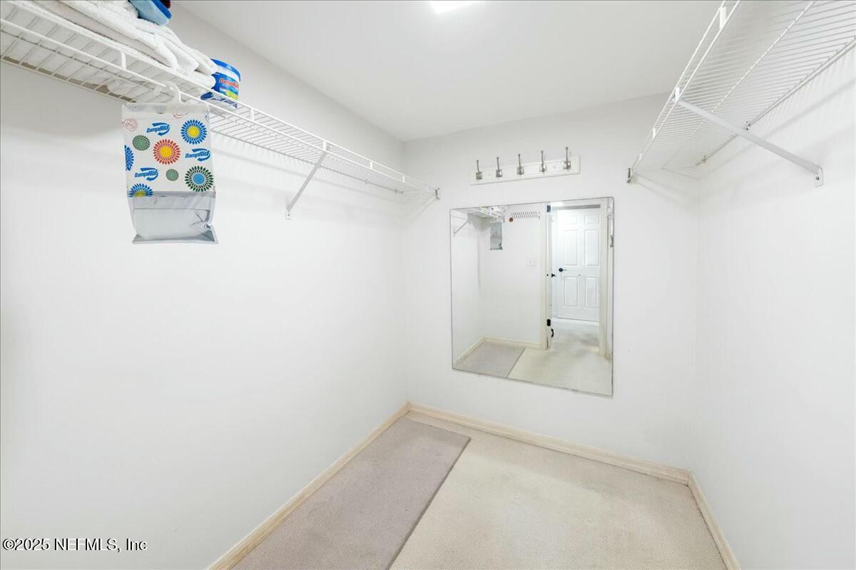 8090 Florida A1A, Unit 102 St. Augustine, FL 32080 - Photo 12 of 49 a bathroom with a window