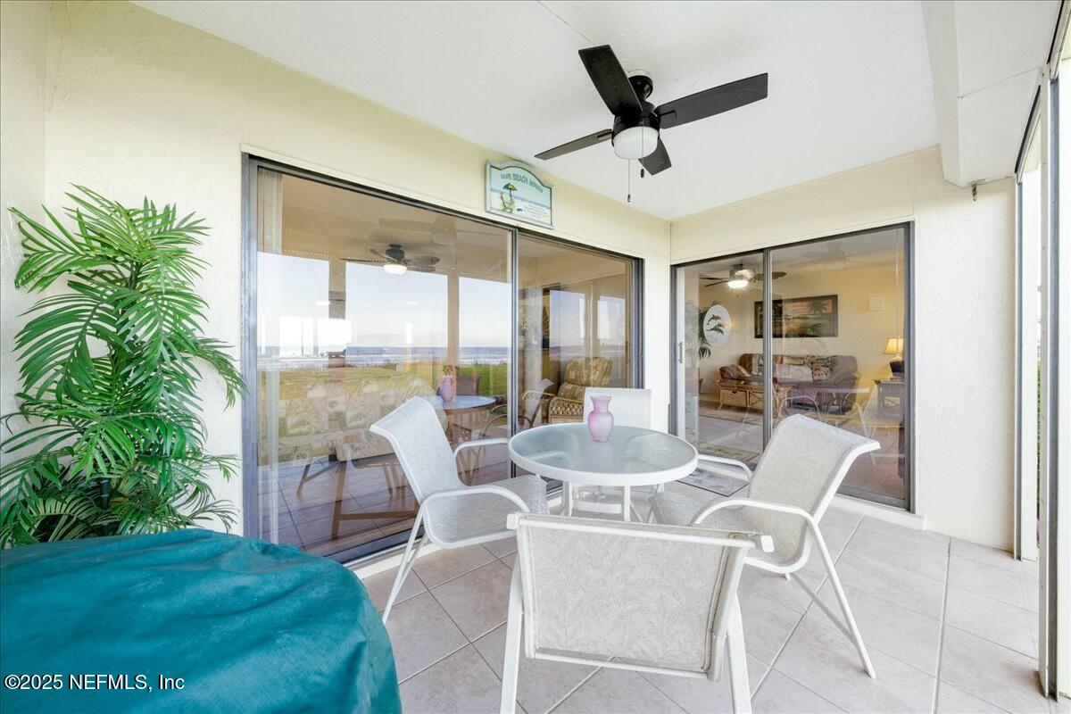 8090 Florida A1A, Unit 102 St. Augustine, FL 32080 - Photo 25 of 49 a view of a dining room with furniture window and outside view