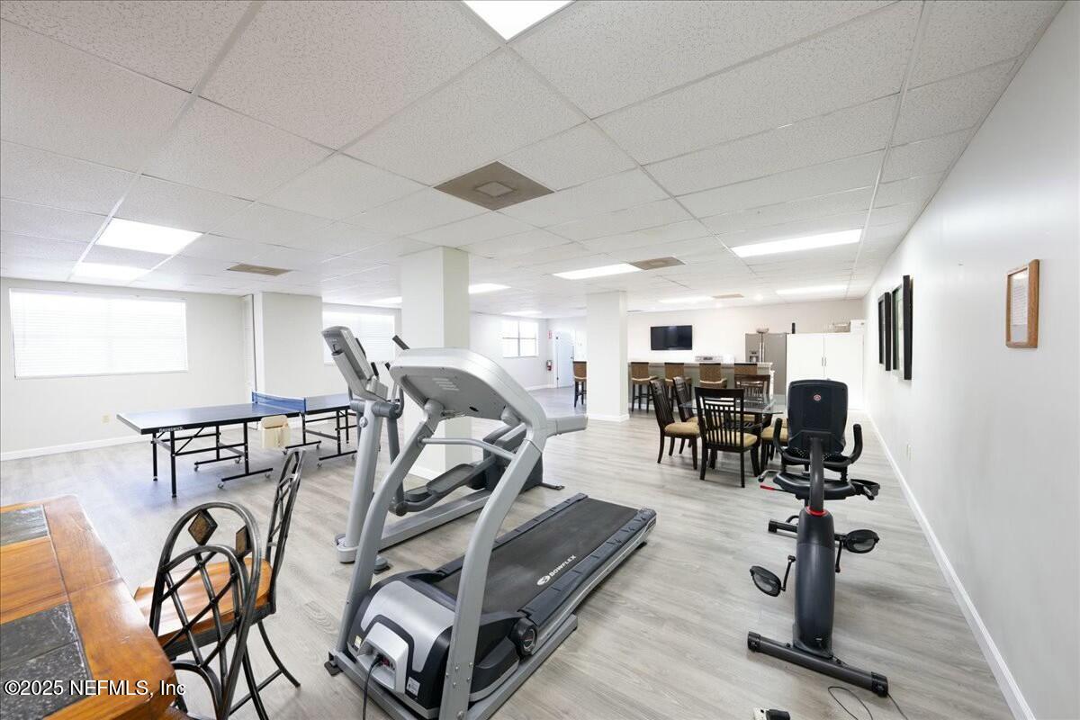 8090 Florida A1A, Unit 102 St. Augustine, FL 32080 - Photo 34 of 49 a view of a room with gym equipment