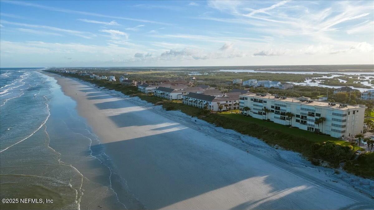 8090 Florida A1A, Unit 102 St. Augustine, FL 32080 - Photo 43 of 49 an aerial view of residential houses with outdoor space