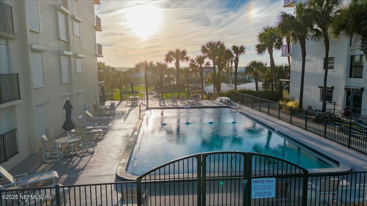 8090 Florida A1A, Unit 102 St. Augustine, FL 32080 - Photo 45 of 49 a view of swimming pool from a balcony
