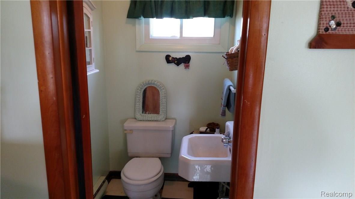 1568 Galbraith Line Road Yale, MI 48097 - Photo 16 of 23 This is a view of the half bath.