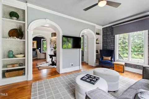 a view of a dining room with furniture window and outside view