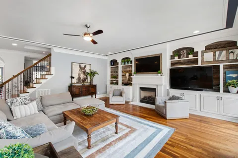a kitchen with stainless steel appliances granite countertop a sink and cabinets