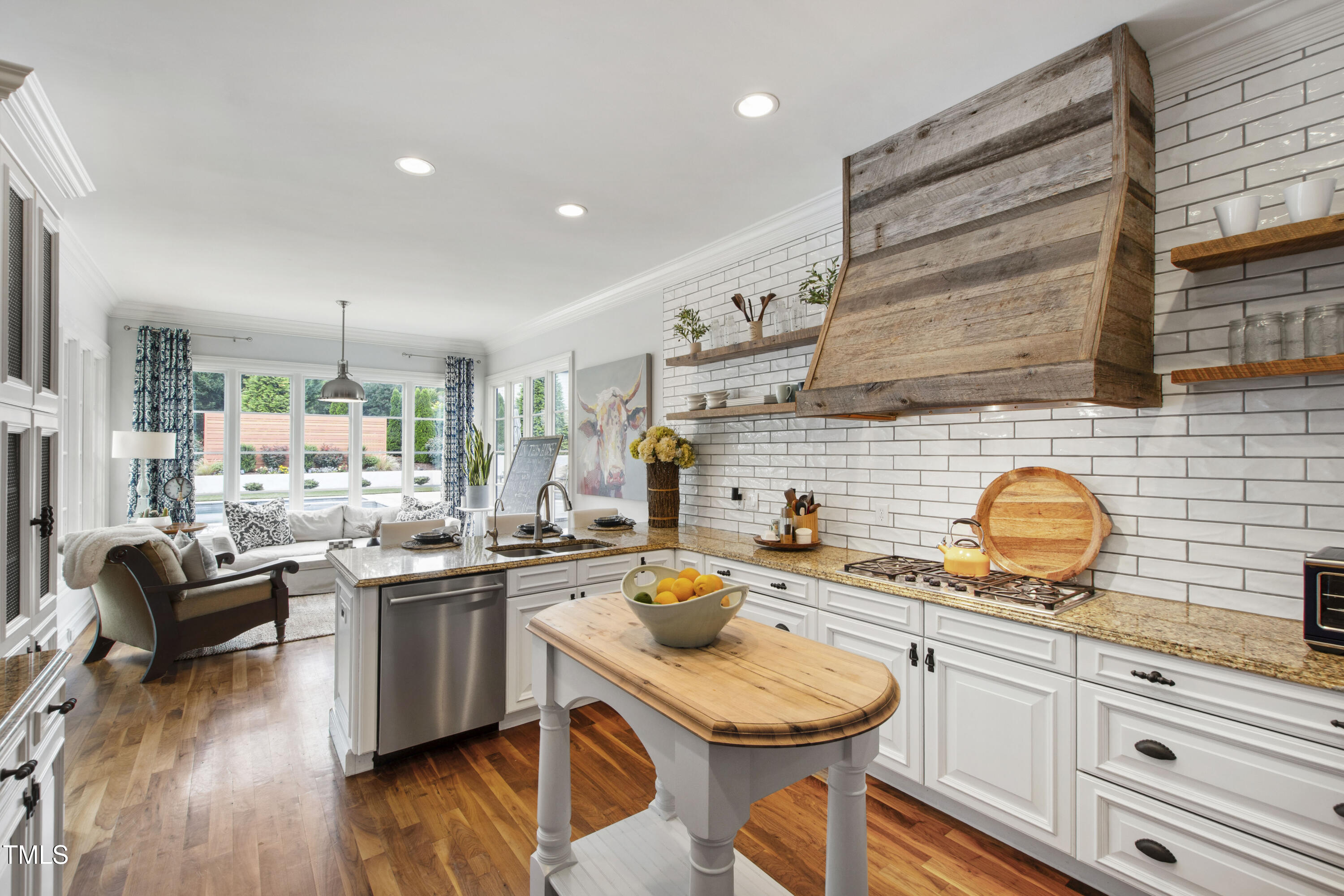 4725 Saratoga Falls Lane Raleigh, NC 27614 - Photo 24 of 97 a kitchen with stainless steel appliances granite countertop a sink and cabinets