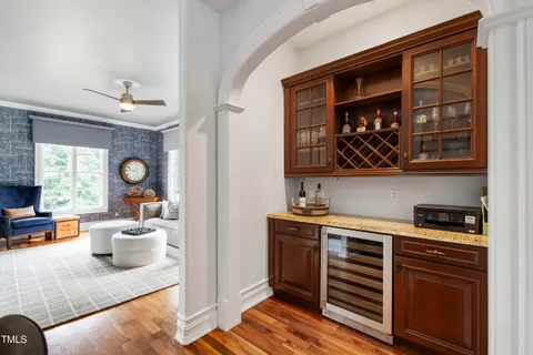a utility room with sink dryer and washer