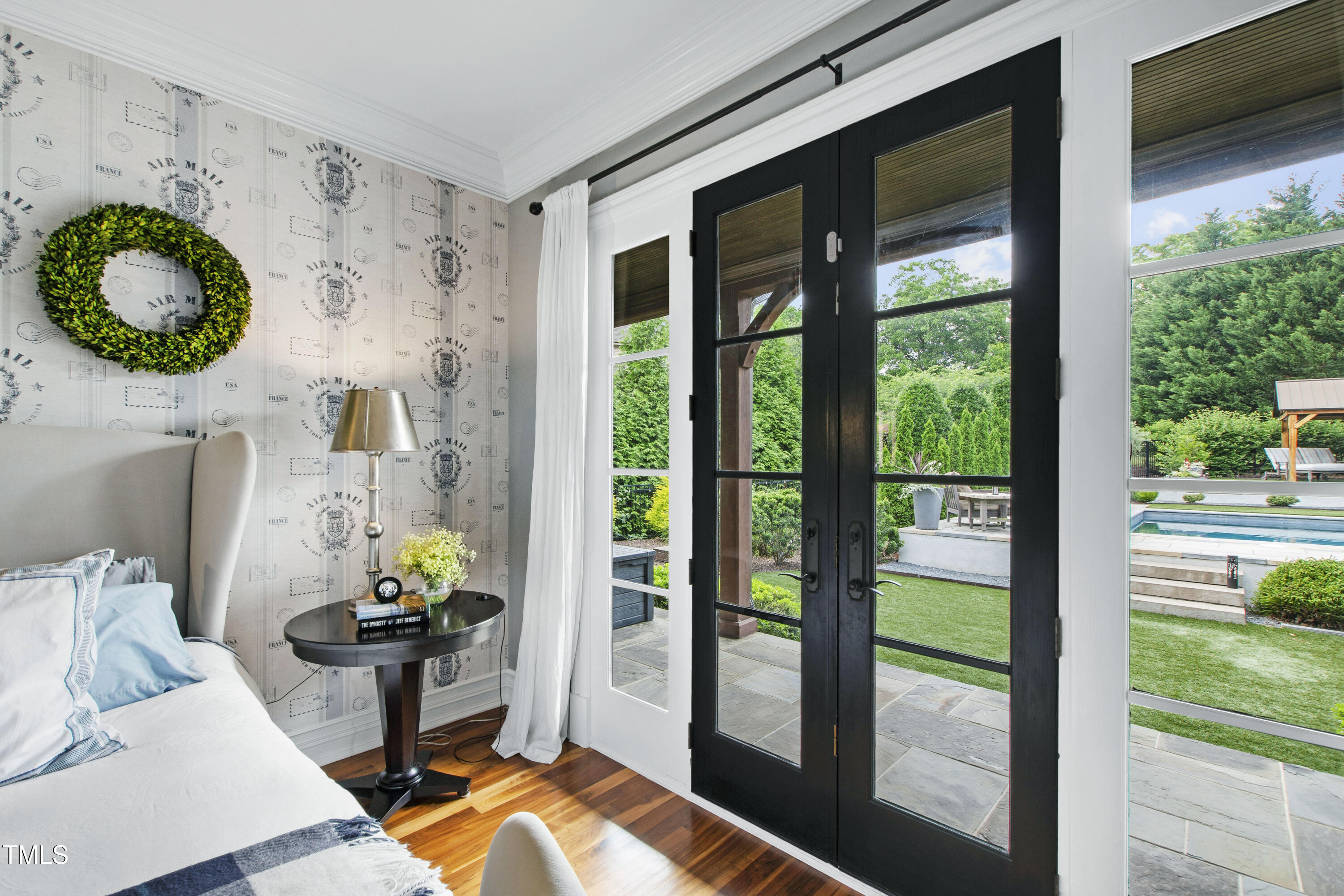 4725 Saratoga Falls Lane Raleigh, NC 27614 - Photo 35 of 97 a living room filled with furniture and a floor to ceiling window