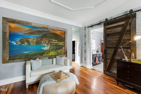 a view of a patio with couches chairs and a fire pit