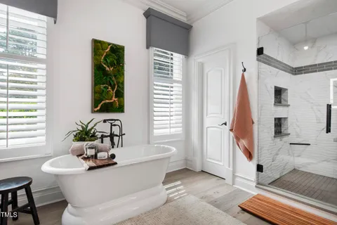 a view of a house with backyard outdoor seating and deck