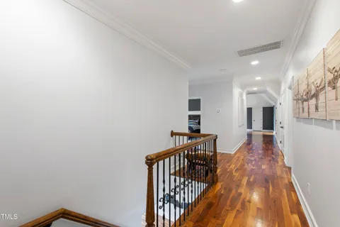 a front view of a house with a yard table and chairs