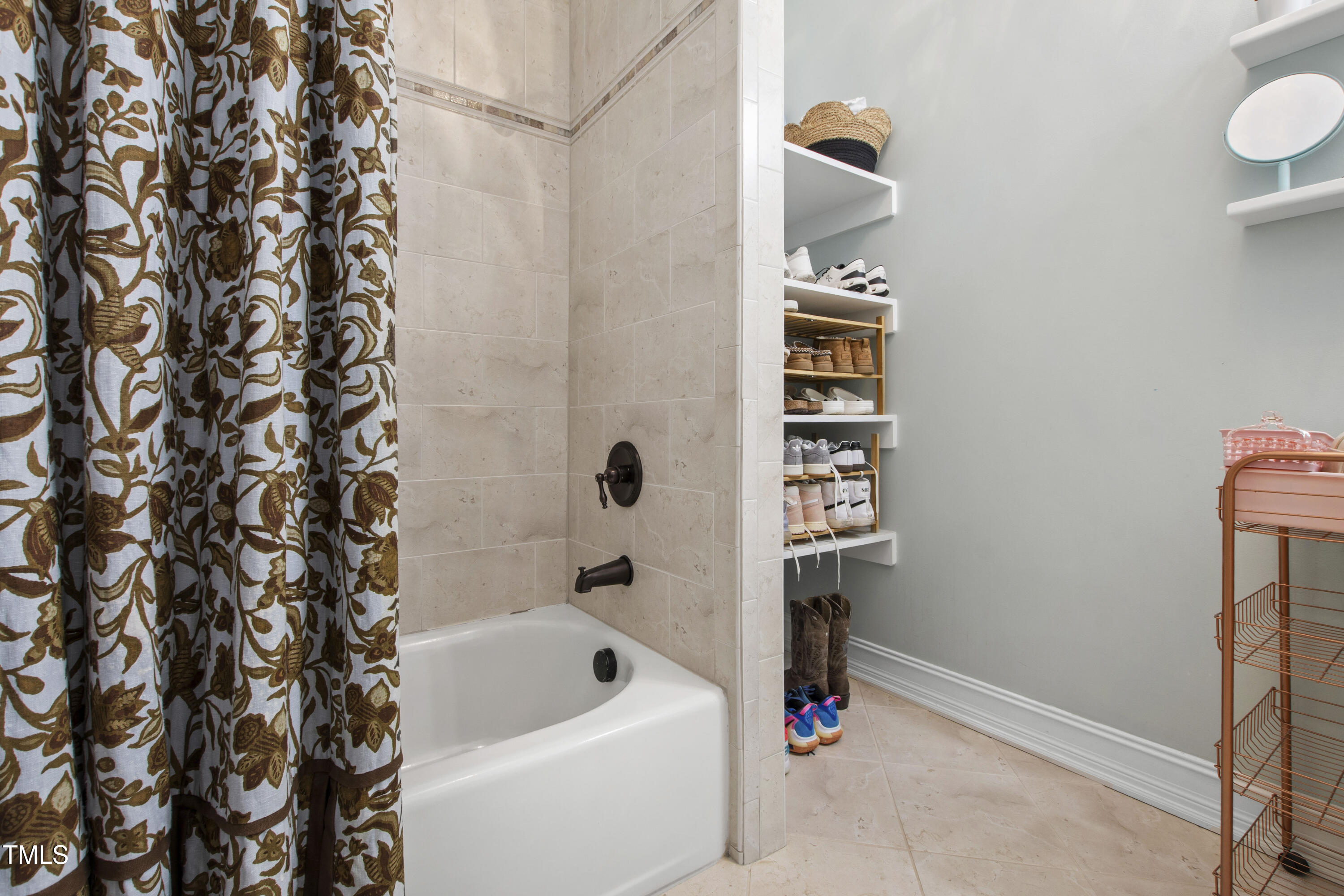 4725 Saratoga Falls Lane Raleigh, NC 27614 - Photo 53 of 97 a bathroom with a bathtub and shower
