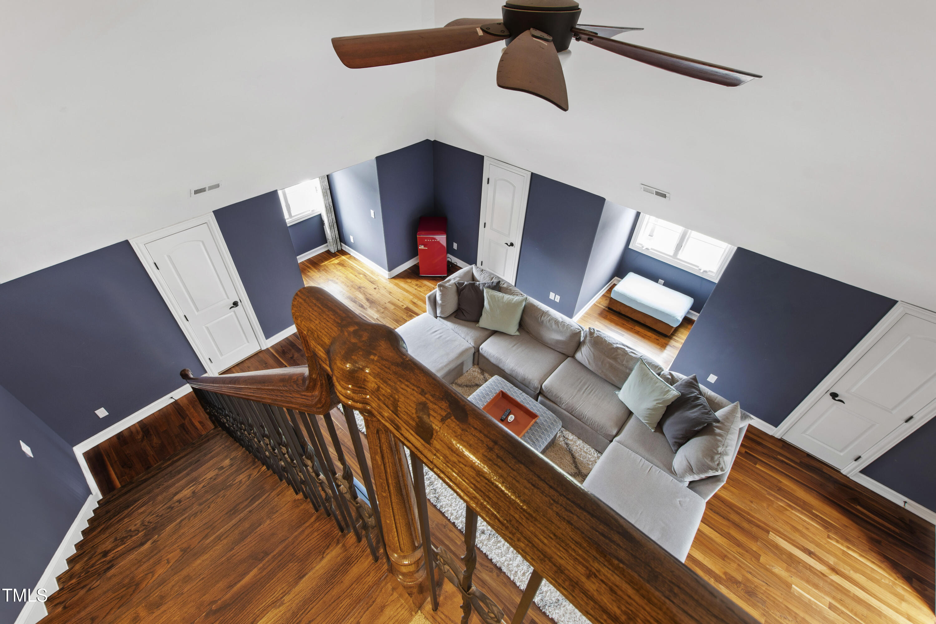 4725 Saratoga Falls Lane Raleigh, NC 27614 - Photo 67 of 97 a living room with furniture and a flat screen tv
