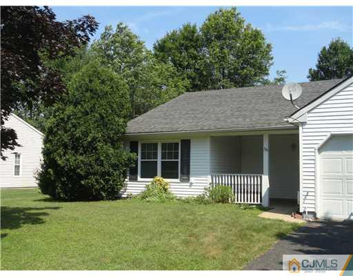 36 Woodbury Road Edison, NJ 08820 - Photo 1 of 15 a view of a house with a garden