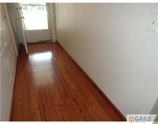 36 Woodbury Road Edison, NJ 08820 - Photo 14 of 15 a view of balcony and wooden floor