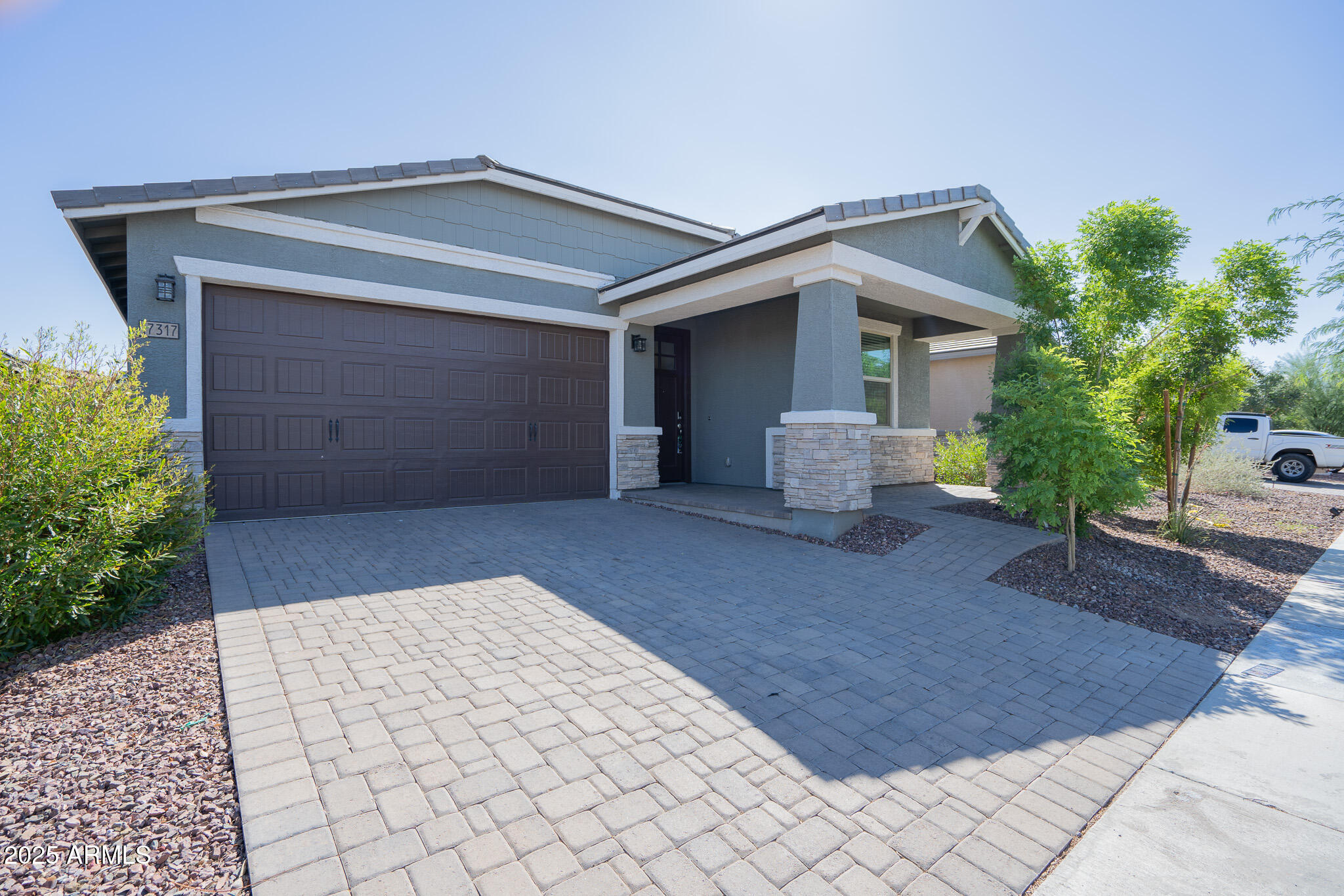 a front view of house with yard