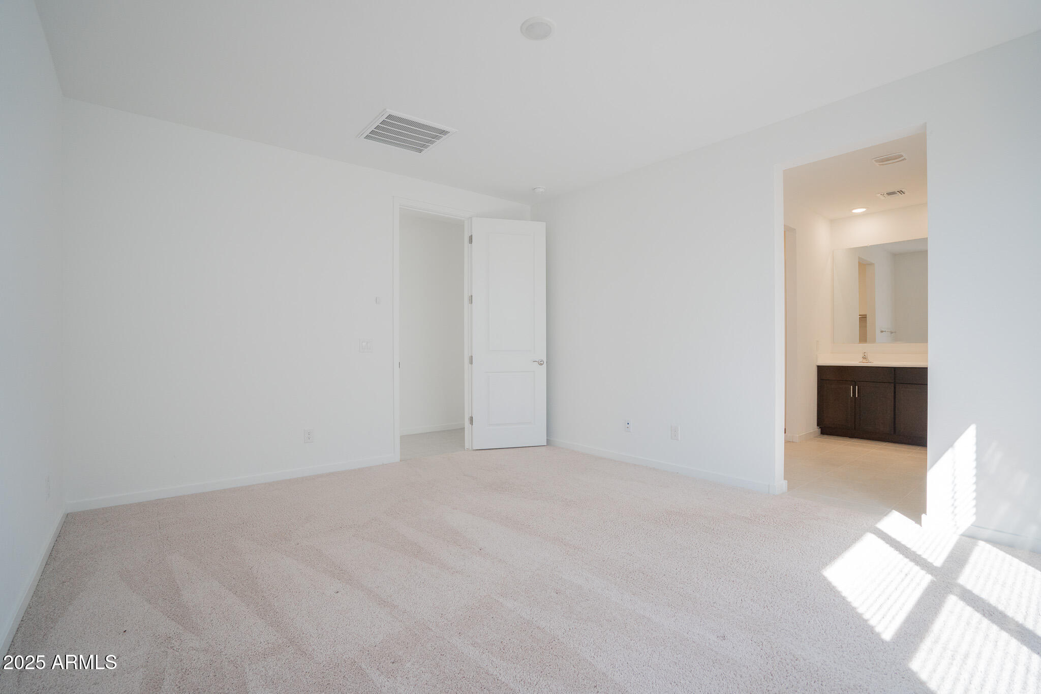 17317 West Running Deer Trail Surprise, AZ 85387 - Photo 17 of 37 a view of an empty room with kitchen