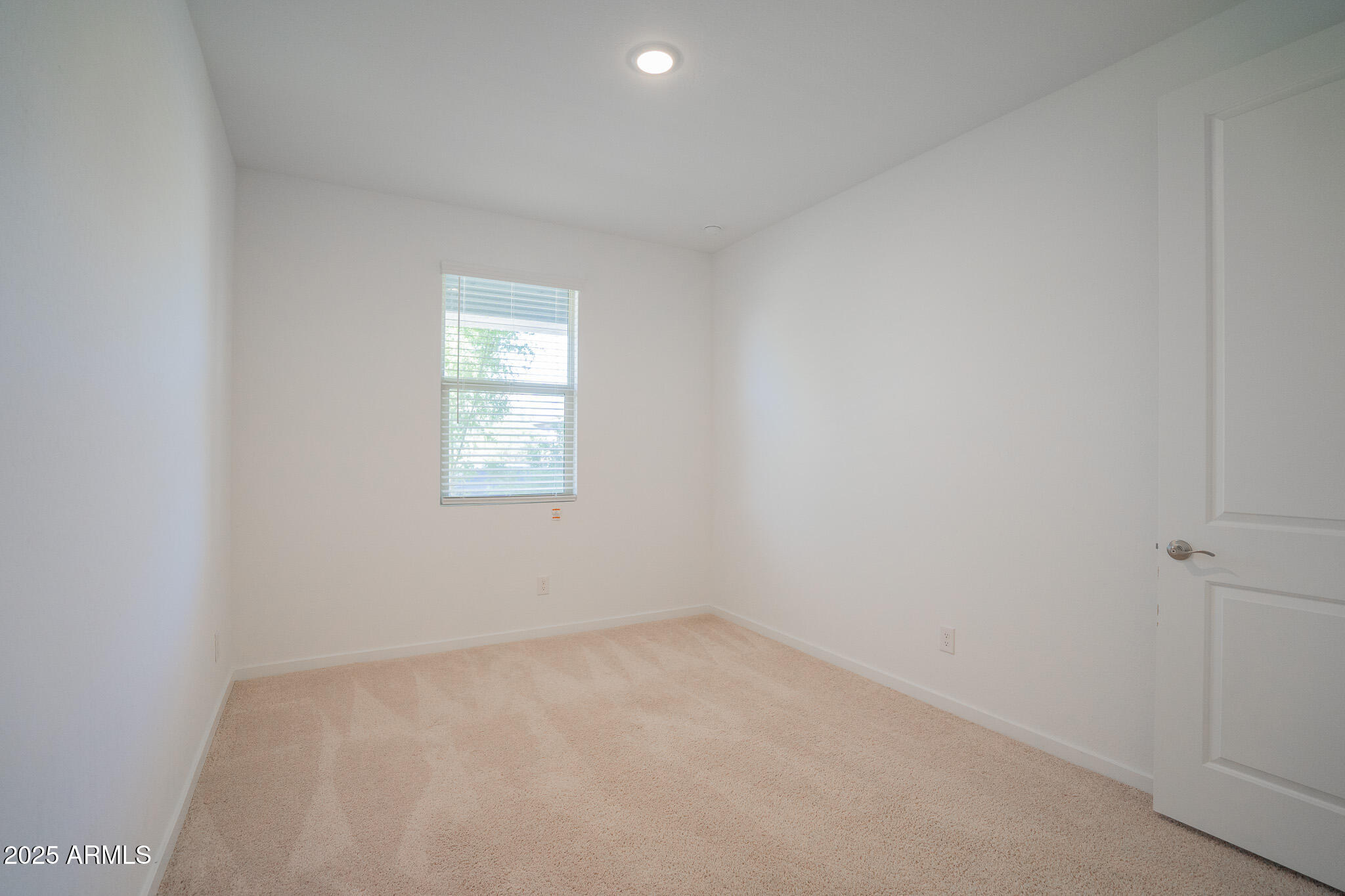 17317 West Running Deer Trail Surprise, AZ 85387 - Photo 26 of 37 an empty room with a window