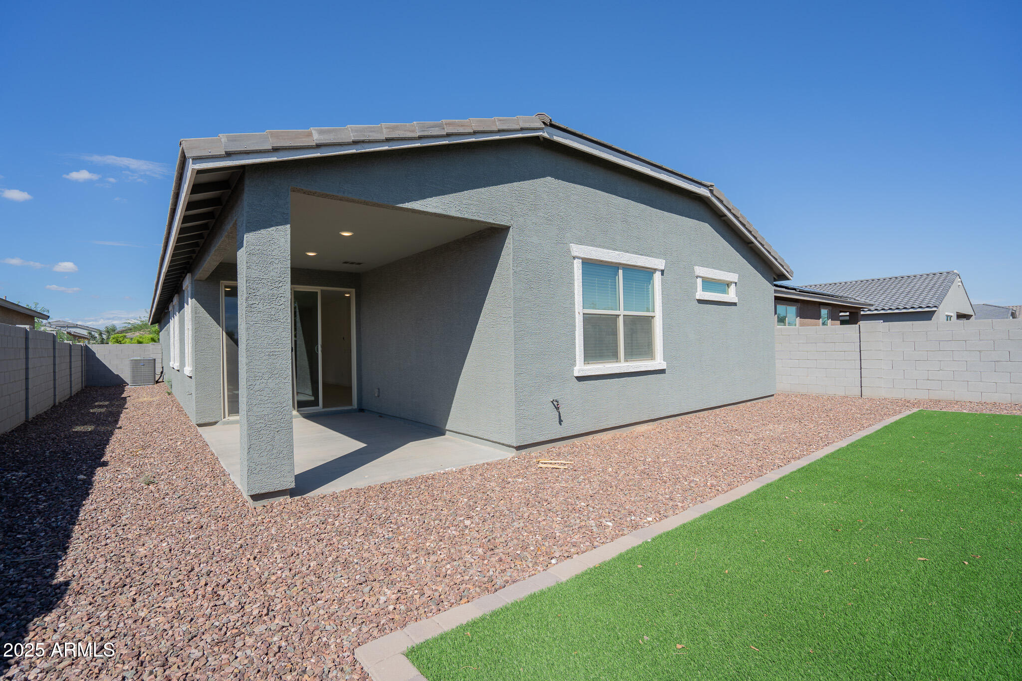 17317 West Running Deer Trail Surprise, AZ 85387 - Photo 33 of 37 a front view of a house with a yard and garage