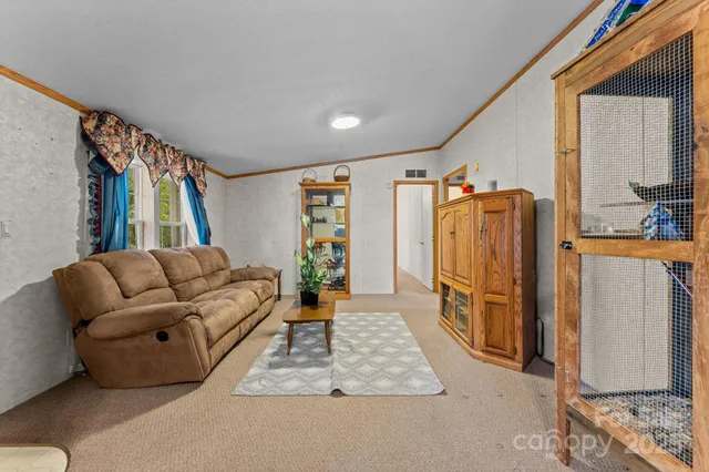 a livingroom with furniture and a couch