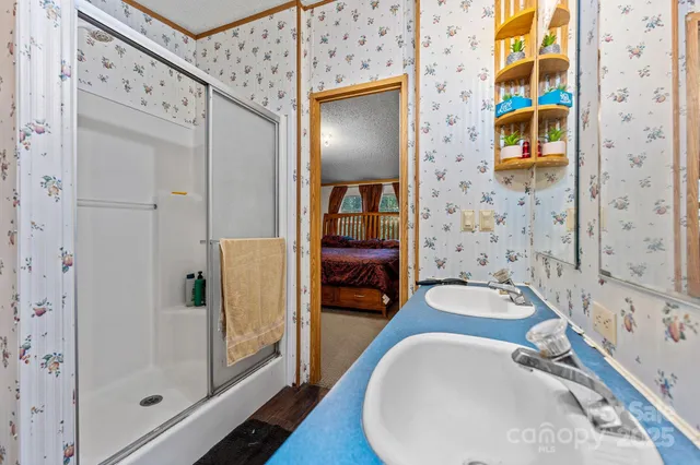 a bathroom with a tub and a shower