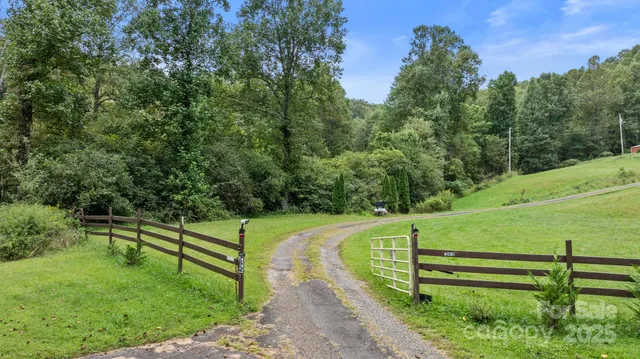 a view of a park with benches in the background