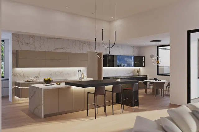 a kitchen with a table and chairs