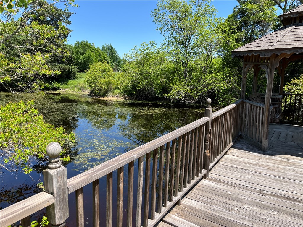 1100 Maple Calvert, TX 77837 - Photo 13 of 31 Dock area with water view and a gazebo