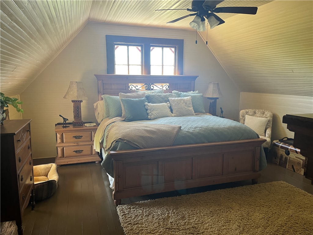1100 Maple Calvert, TX 77837 - Photo 16 of 31 Upstairs bedroom with wooden ceiling, wood flooring, and lofted ceiling