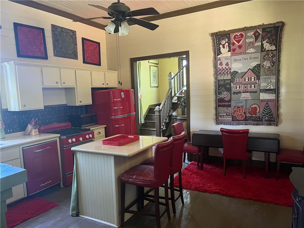 1100 Maple Calvert, TX 77837 - Photo 19 of 31 Kitchen featuring nostalgic appliances, island, an