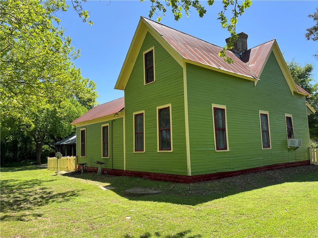 1100 Maple Calvert, TX 77837 - Photo 4 of 31 Back and side of home yard, metal roof