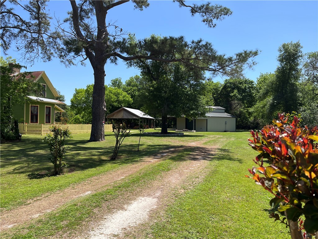1100 Maple Calvert, TX 77837 - Photo 5 of 31 Crepe myrtle's line the scenic entry