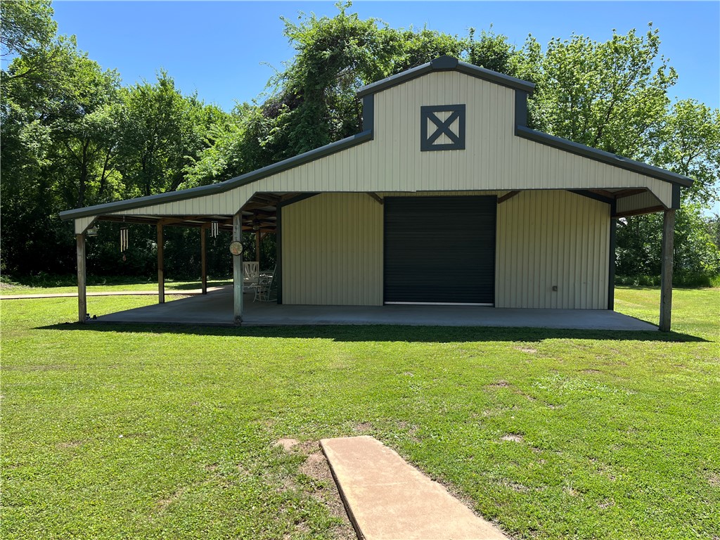 1100 Maple Calvert, TX 77837 - Photo 7 of 31 Detached garage has overhead doors on both ends for easy access
