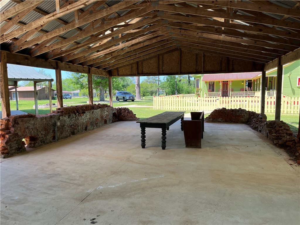 1100 Maple Calvert, TX 77837 - Photo 10 of 31 Covered outdoor space lined with original Calvert