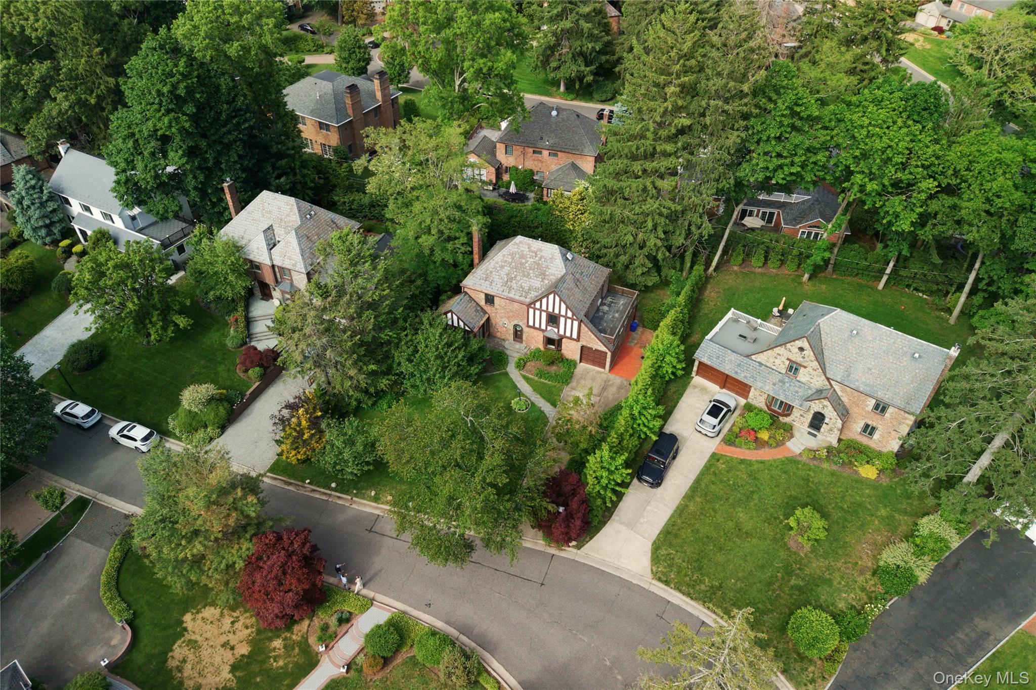 142 Mill Spring Road Manhasset, NY 11030 - Photo 20 of 23 an aerial view of a house having yard