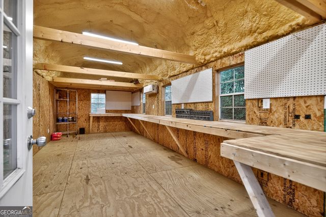 a house with trees in front of it