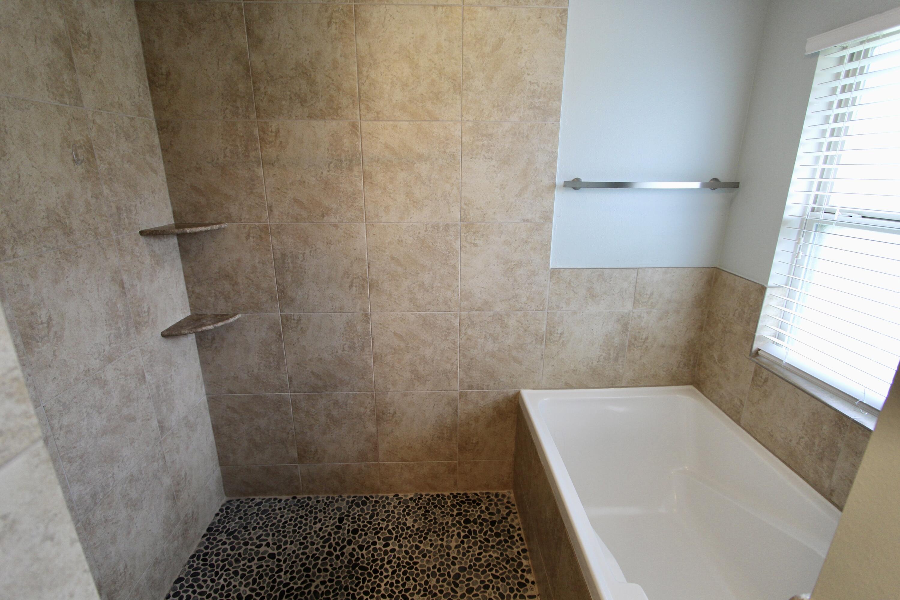 4641 Chanan Drive Crestview, FL 32539 - Photo 22 of 45 a bathroom with a window