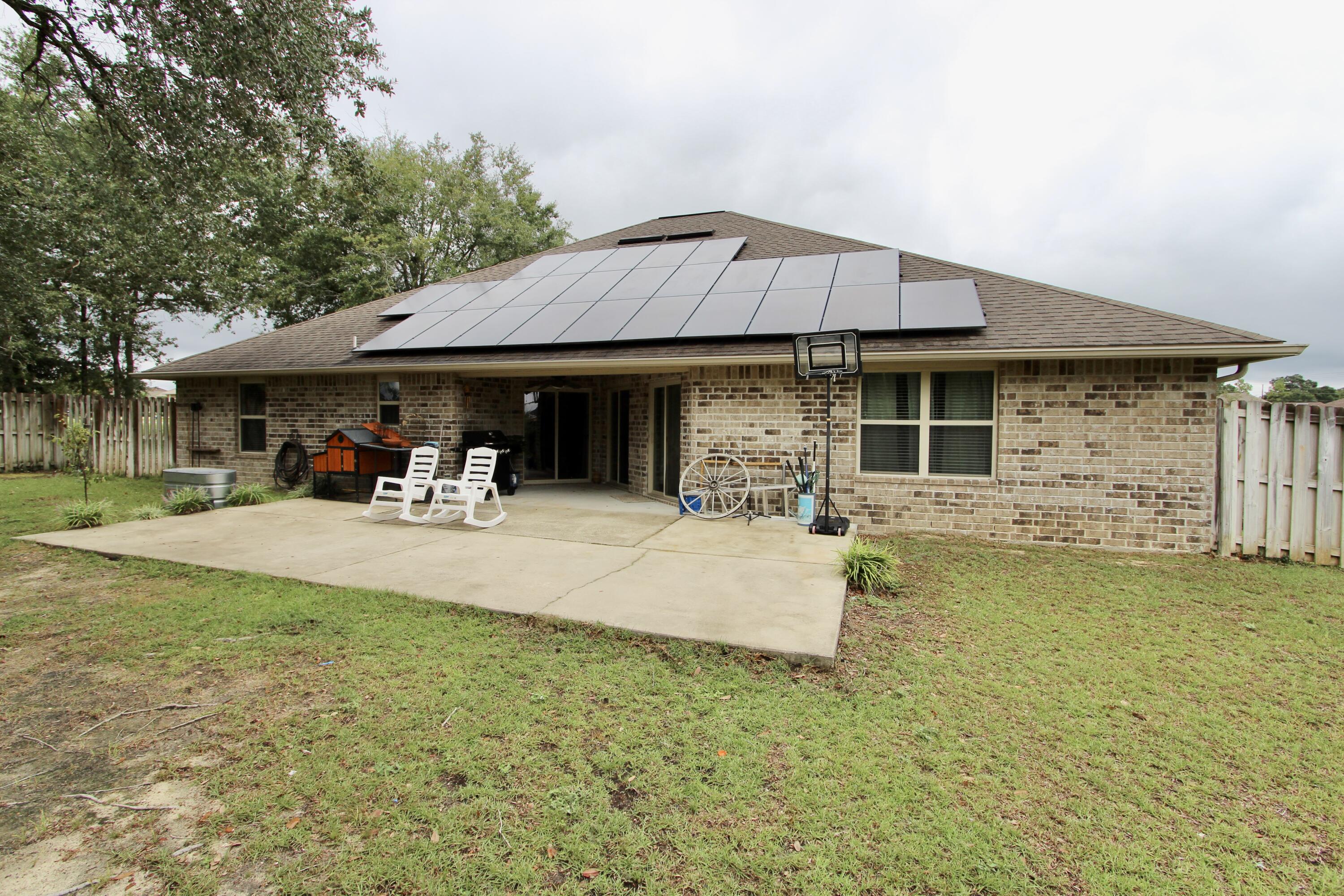4641 Chanan Drive Crestview, FL 32539 - Photo 41 of 45 a view of a house with pool table and chairs