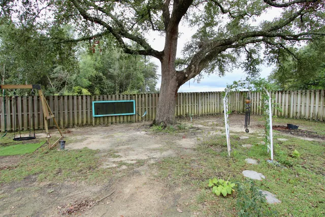 a view of a garage with parked cars