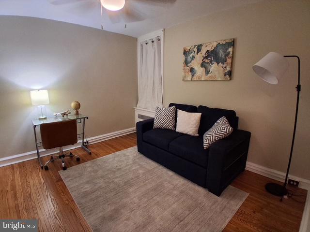 7975 Provident Street Philadelphia, PA 19150 - Photo 17 of 23 a living room with furniture and a wooden floor
